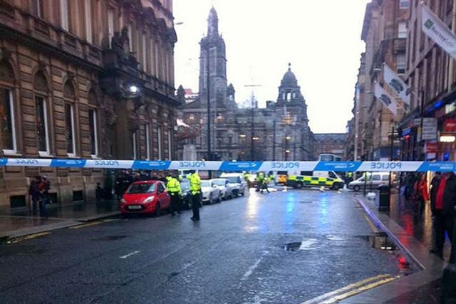 Handout photo taken with permission from the Twitter feed of @BMol14loy of the scene in Glasgow's George Square after a it is understood a bin lorry has crashed into a group of pedestrians. 
