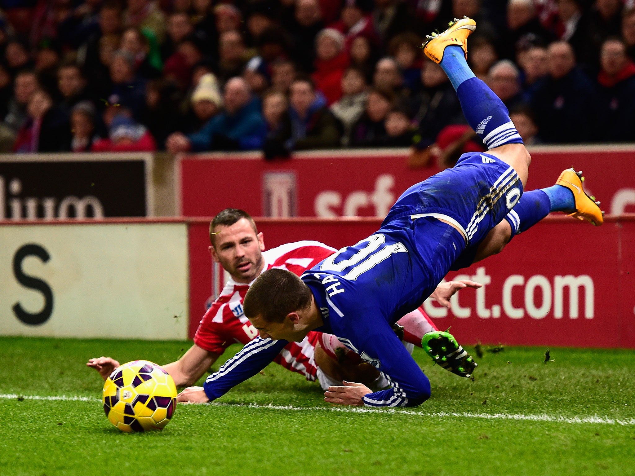 Chelsea's Eden Hazard is fouled by Phil Bardsley of Stoke