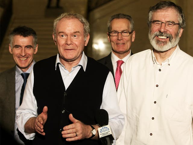 Martin McGuinness (second left) refused to make ‘Tory cuts’