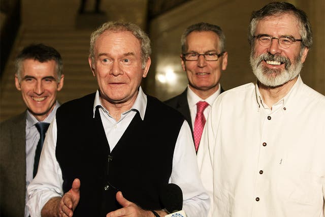 Martin McGuinness (second left) refused to make ‘Tory cuts’