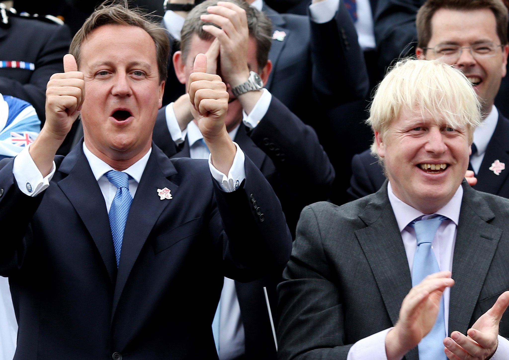 David Cameron and Boris Johnson celebrate Great Britain's Olympic athletes during a 2012 parade