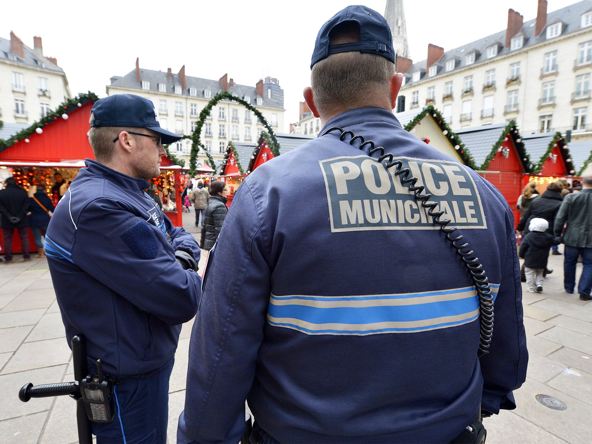 Police patrol Nantes market a day after the attack (AFP)