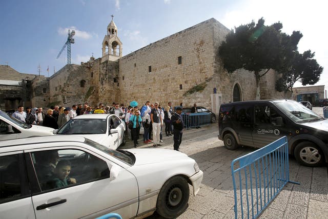 The Church of the Nativity in Manger Square, Bethlehem, where tourists and cars compete for space
