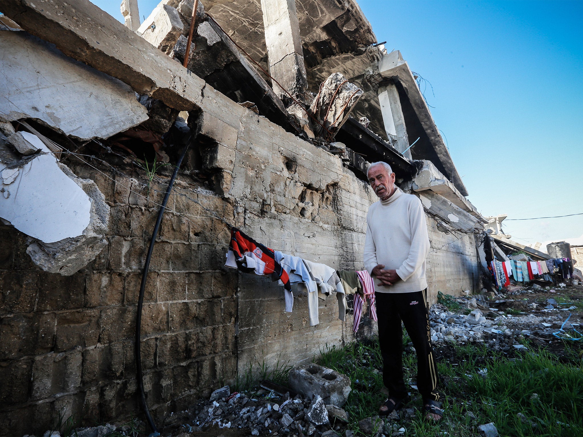 Abdullah Wahdan’s family homes were destroyed during air strikes in July. Two members of his family were killed then and four others were died in subsequent bombings