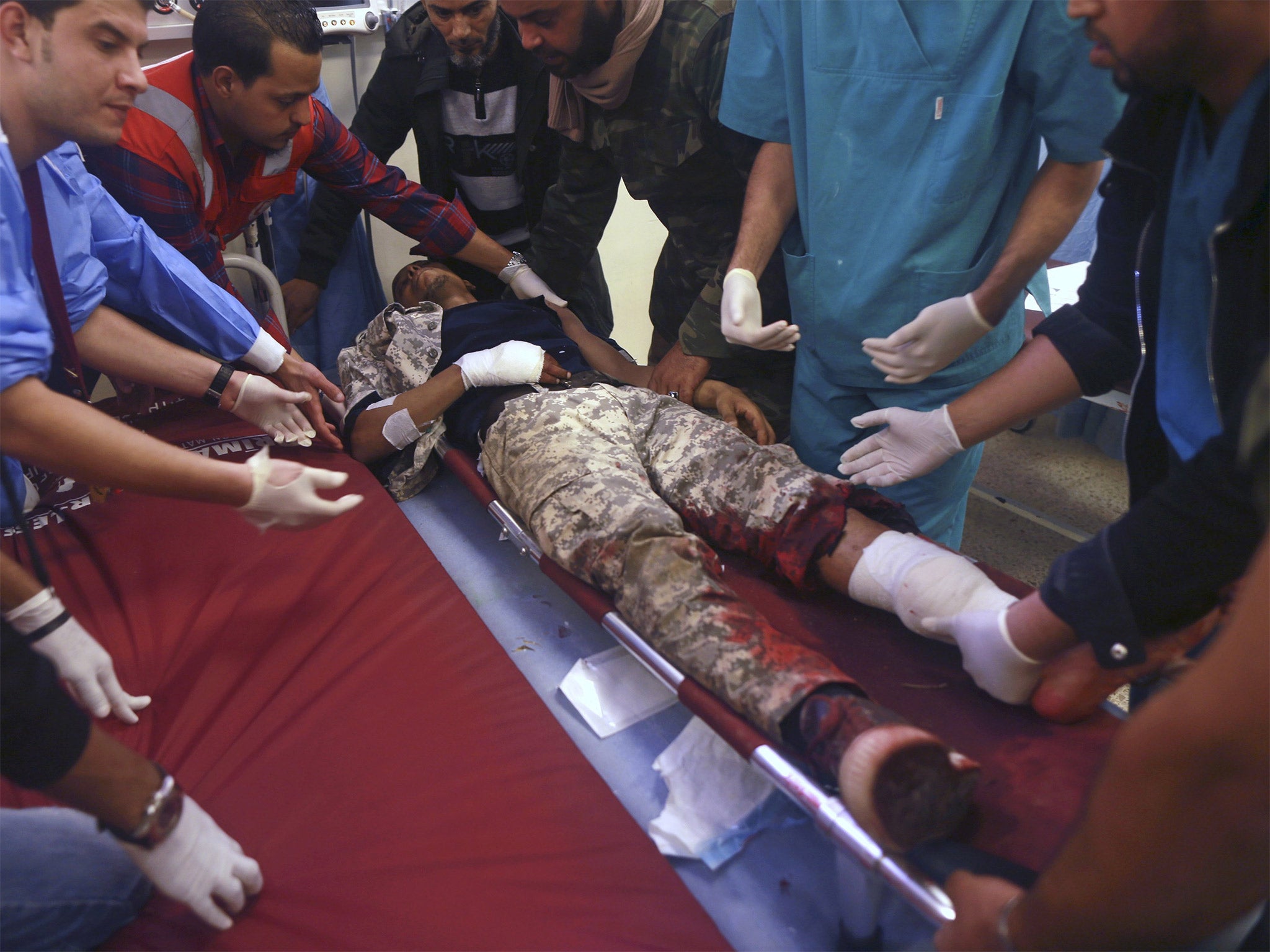 A Libyan military personnel receives medical treatment in Benghazi earlier this week