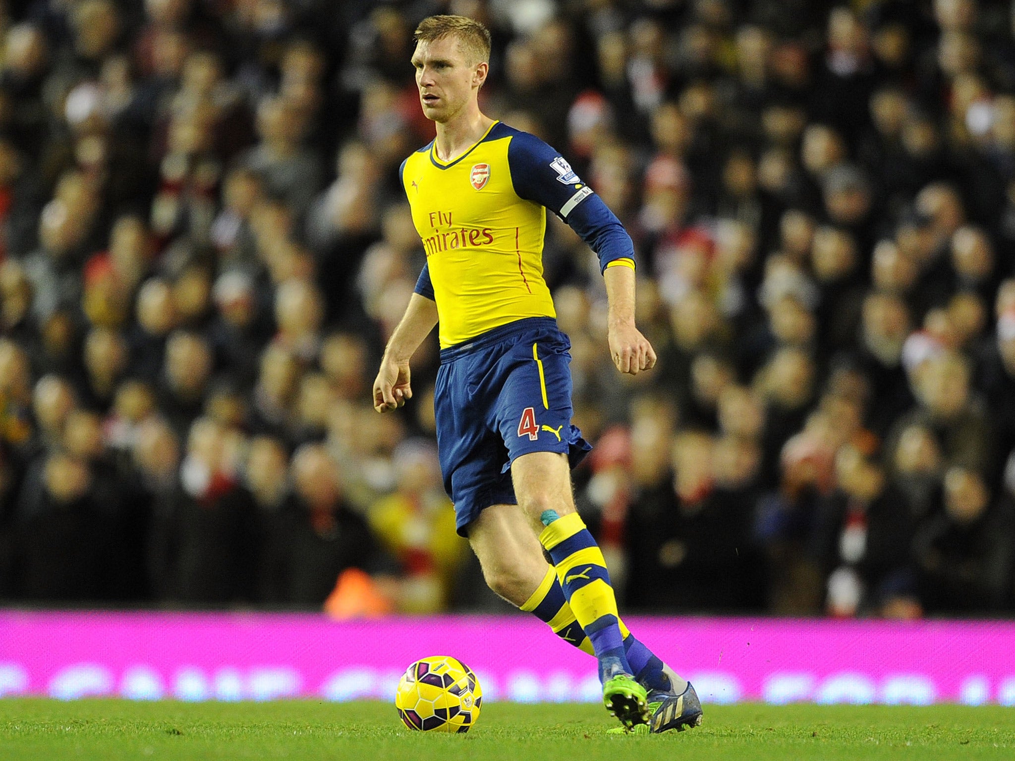 Per Mertesacker has suffered from having different central-defensive partners, according to his manager