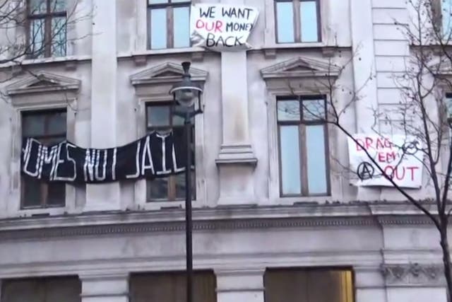 Squatting protesters take over former RBS office.