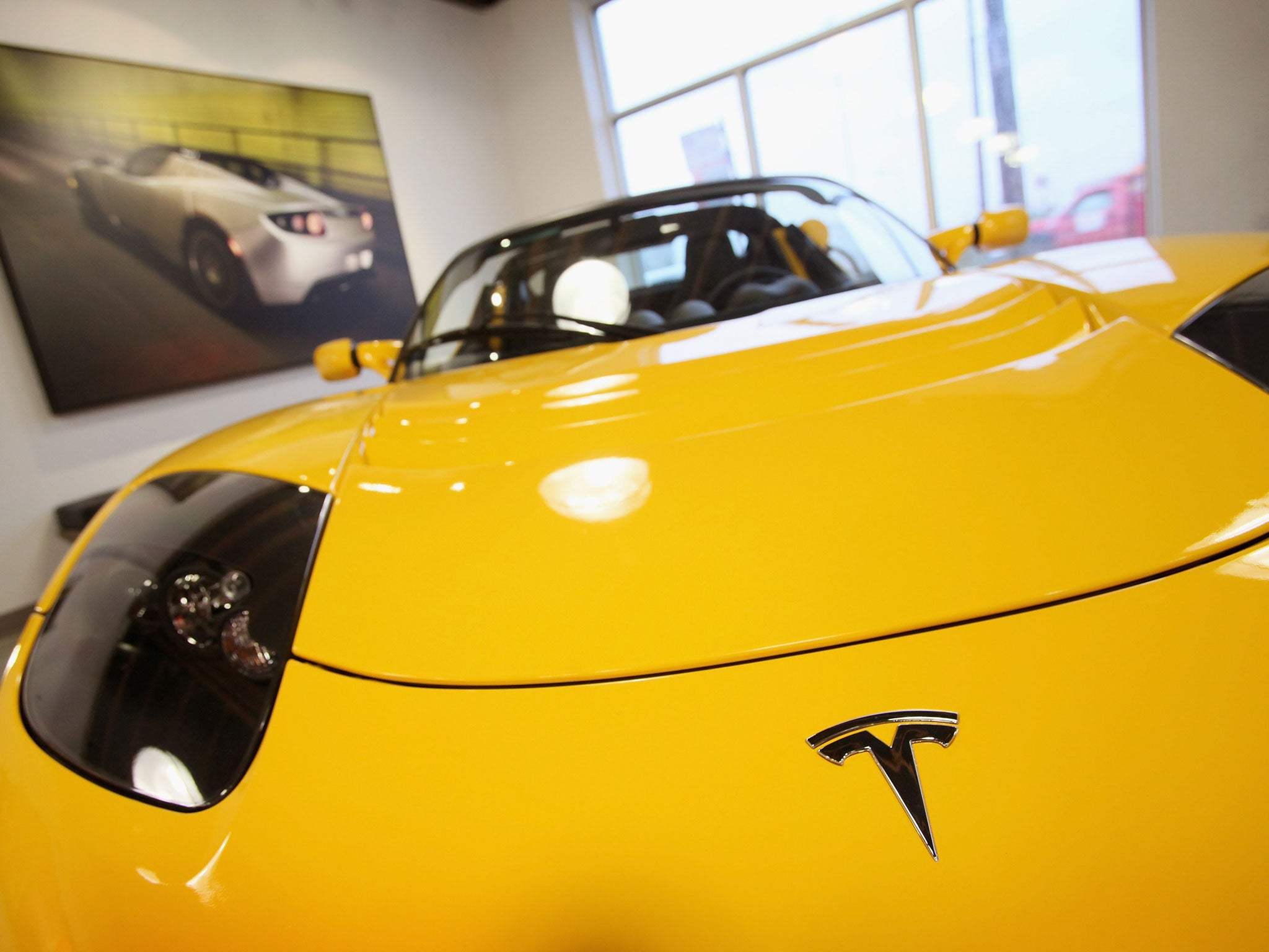 Tesla's roadster, in a dealership