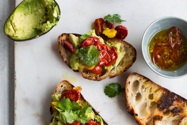 Avocado and spiced roasted tomatoes on sourdough