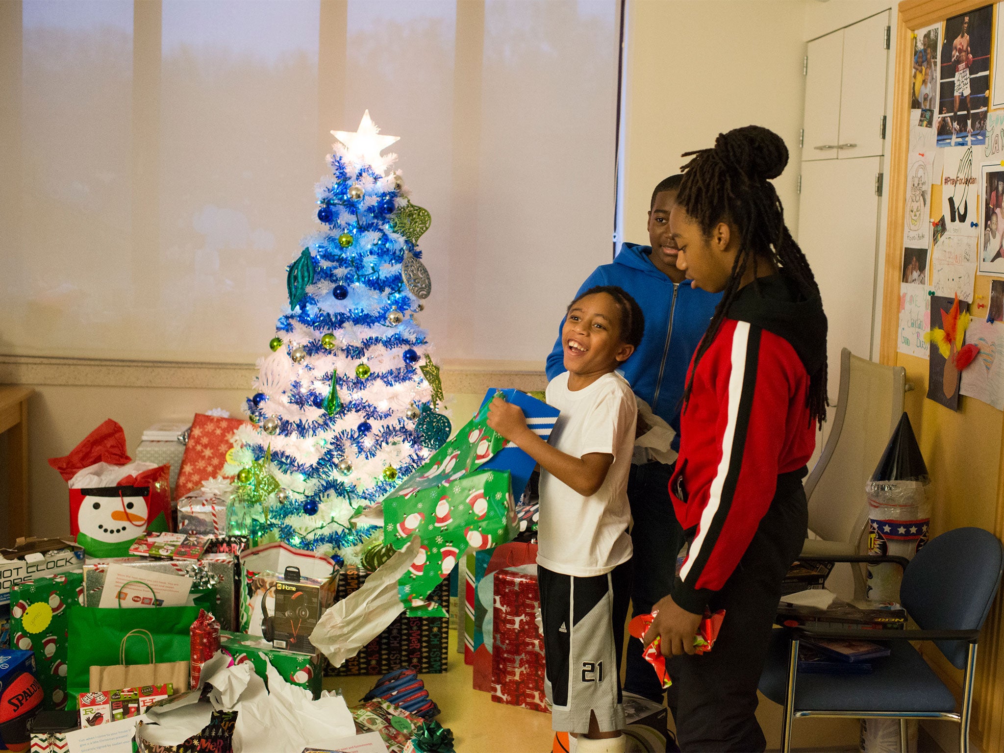 Jaydan reacts with excitement to a gift he likes