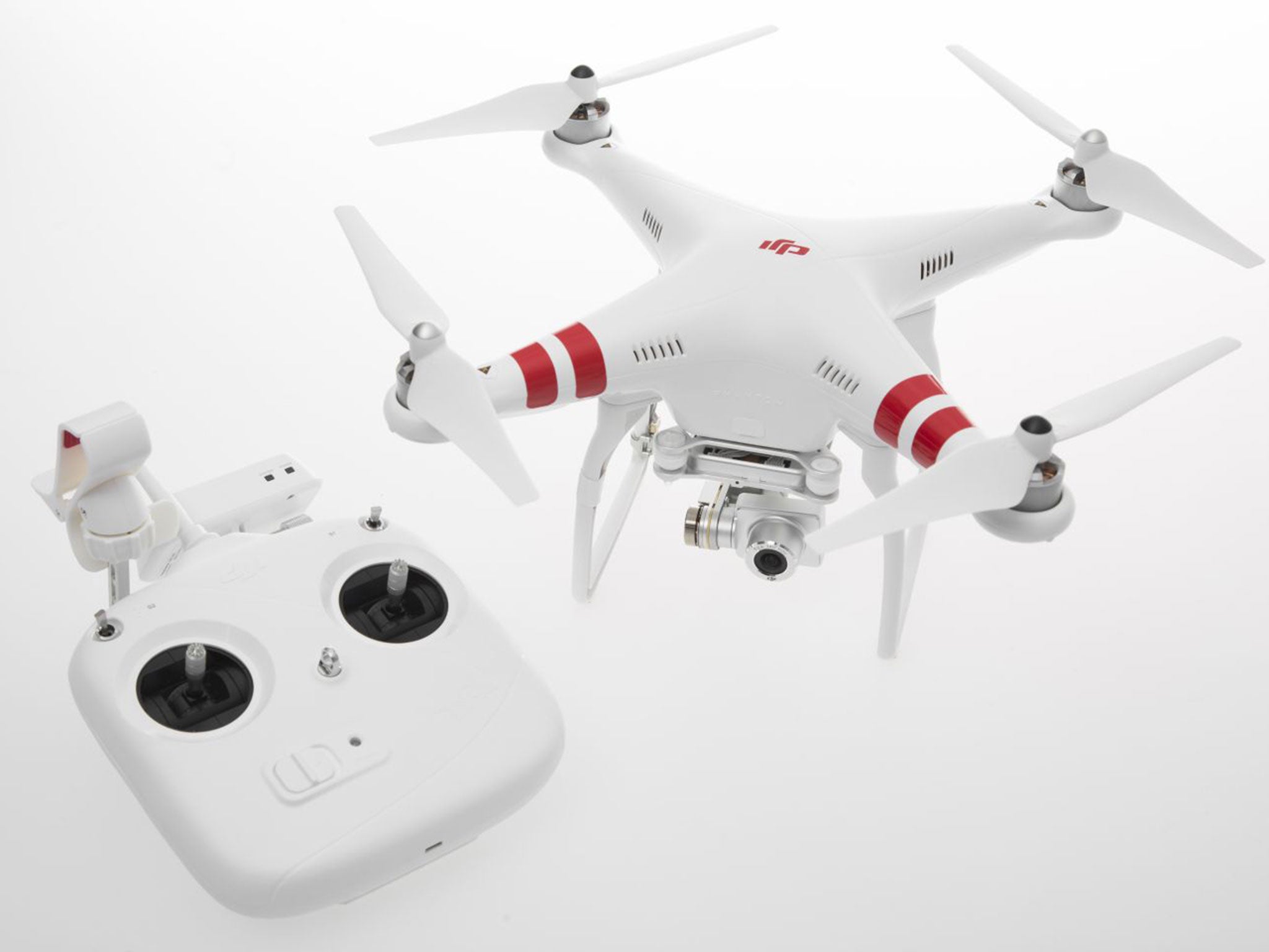 Regulations imposed on drones such as the DJI Phantom (pictured) include a ban on flying over congested areas or within 50 metres of people or buildings without official permission