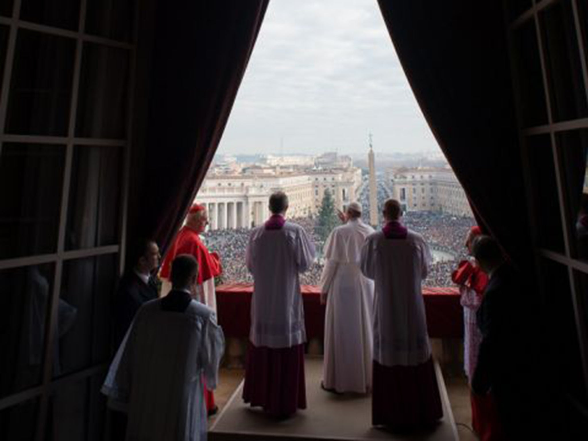 Pope Francis giving the traditional “Urbi et Orbi” blessing from the balcony of St Peter’s Basilica