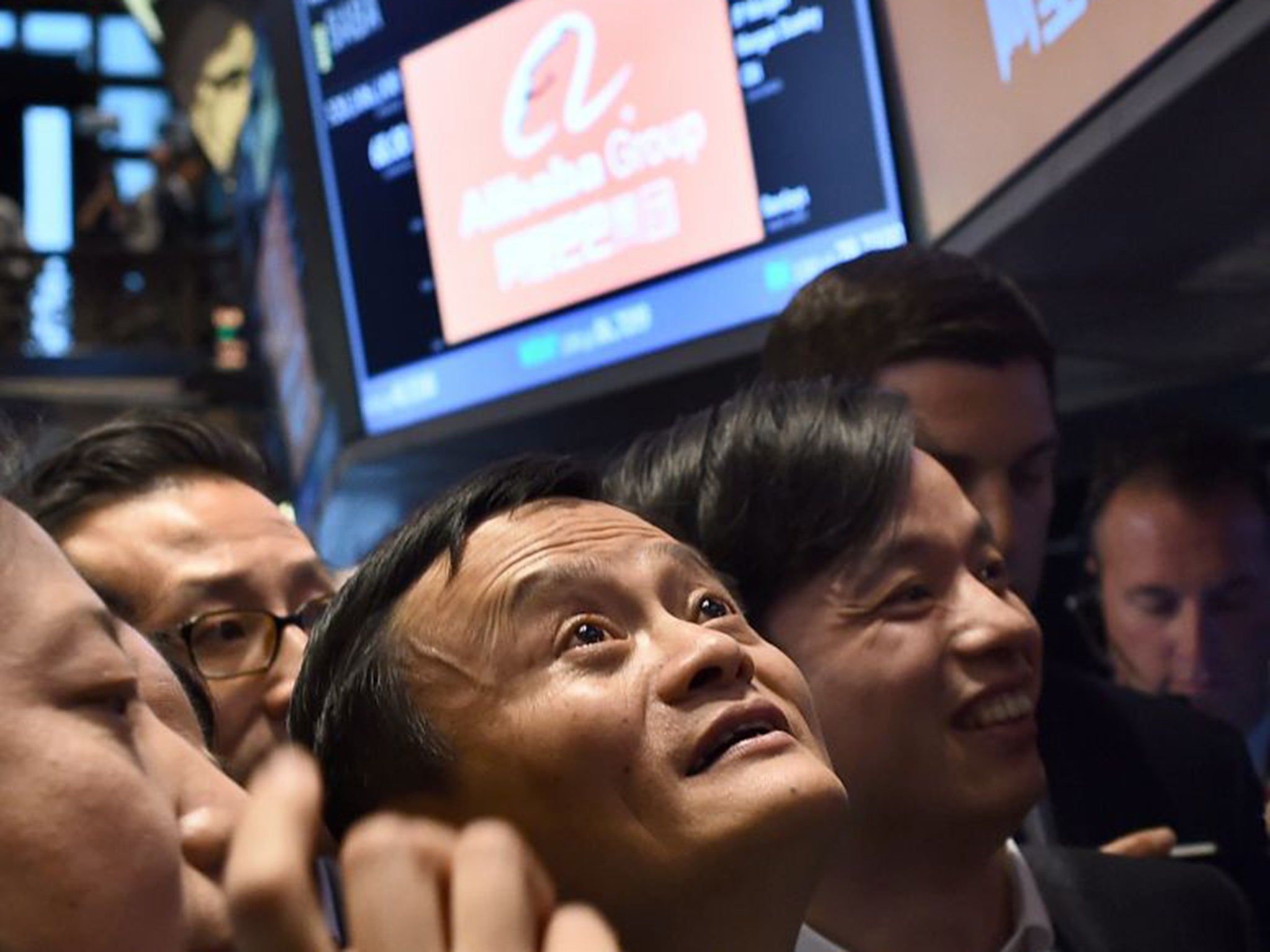 Alibaba founder Jack Ma – now the richest person in China – waits for his company’s stock to go live on the floor at the New York Stock Exchange in September