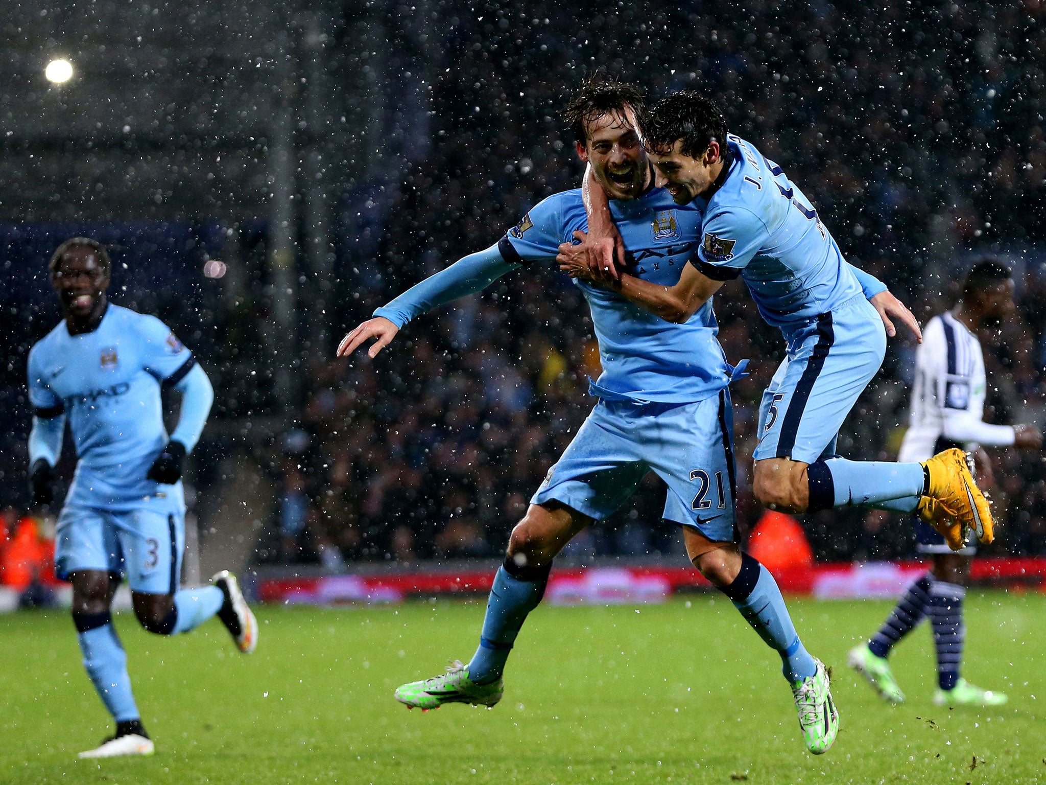 David Silva celebrates scoring Manchester City's third goal