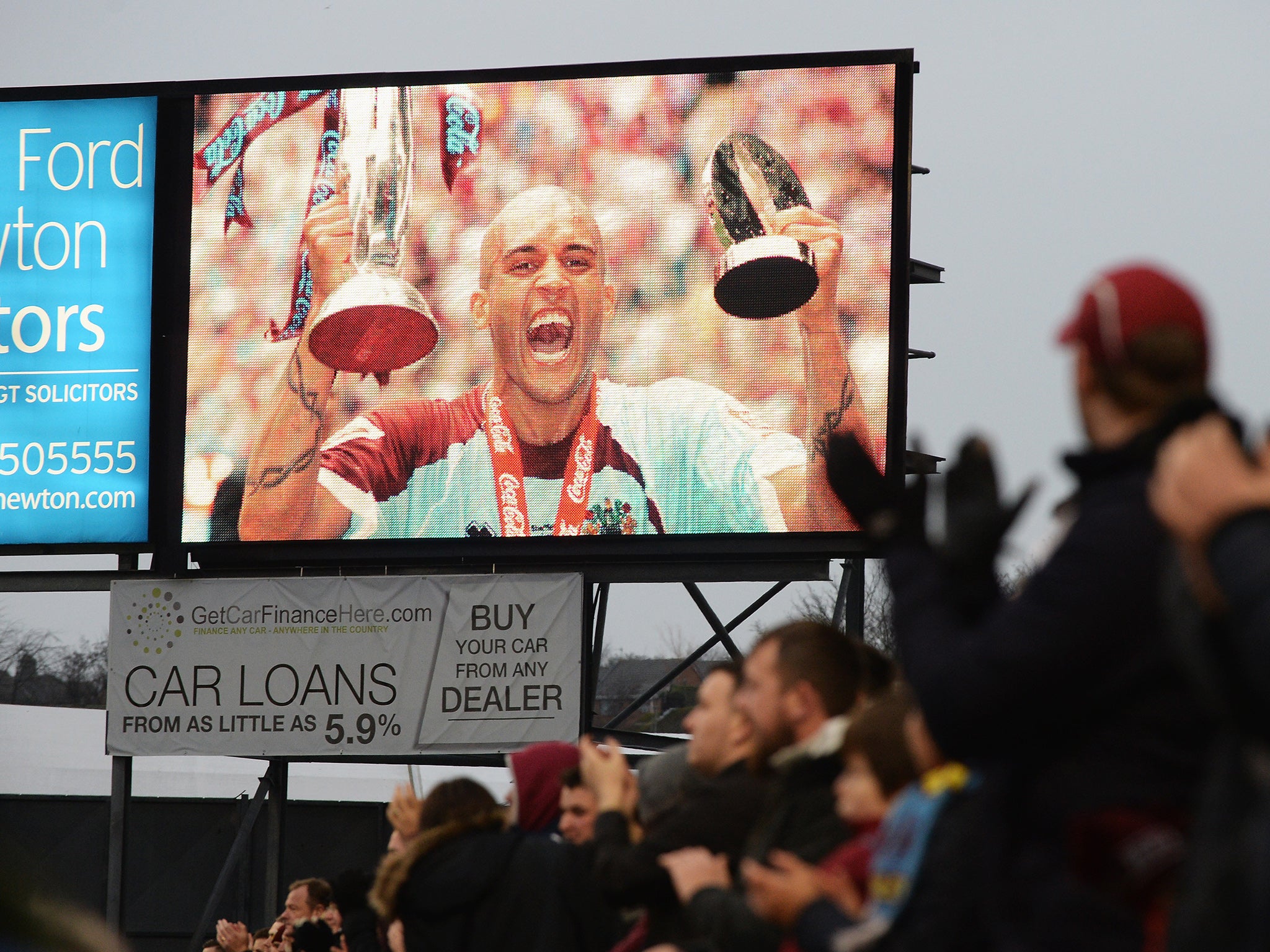 Turf Moor held a minute's applause after five minutes to wish former Burnley defender Clarke Carlisle, who was hit by a lorry, back to health