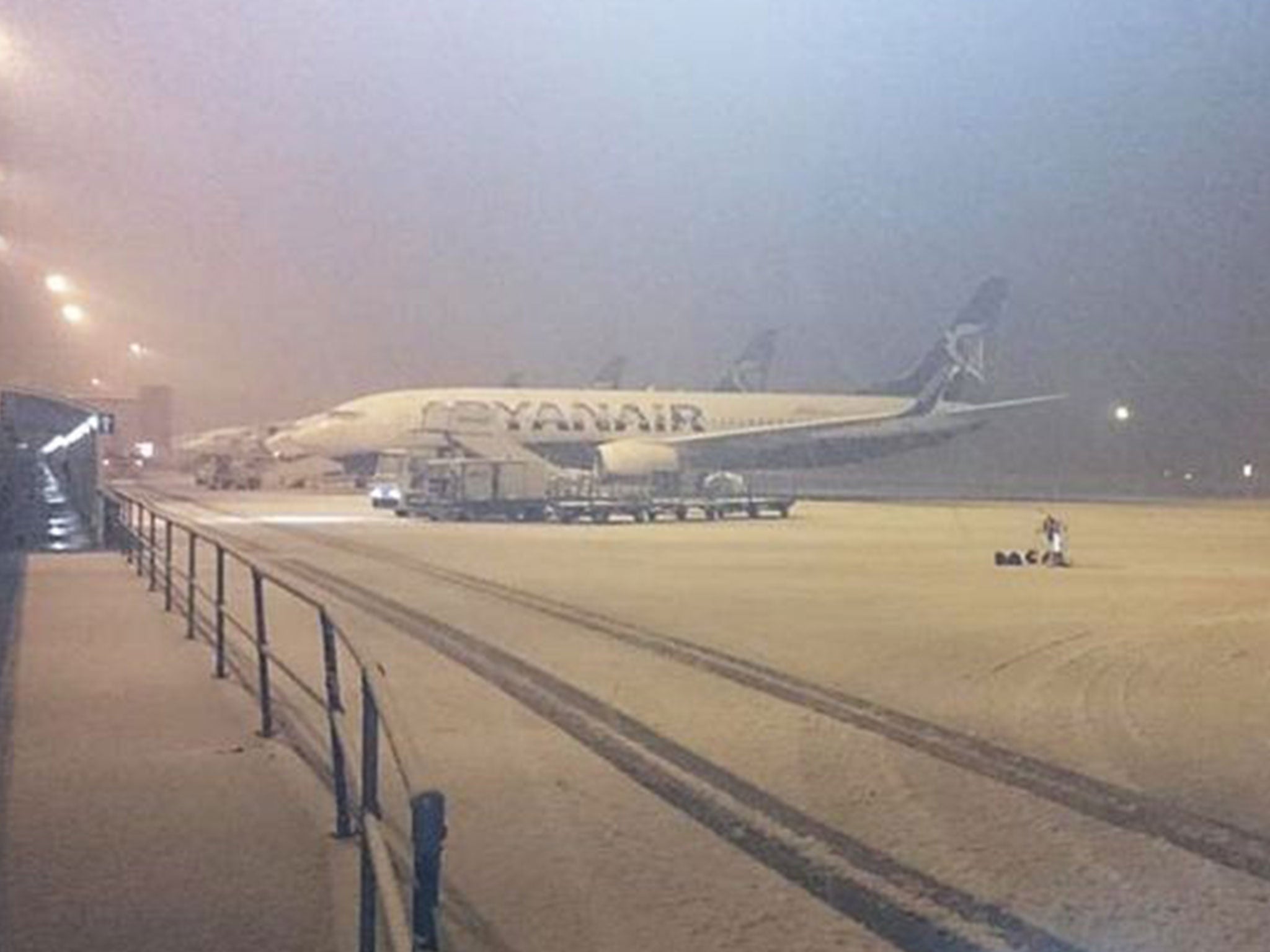 Snow at Liverpool's John Lennon Airport, which closed temporarily on Friday night