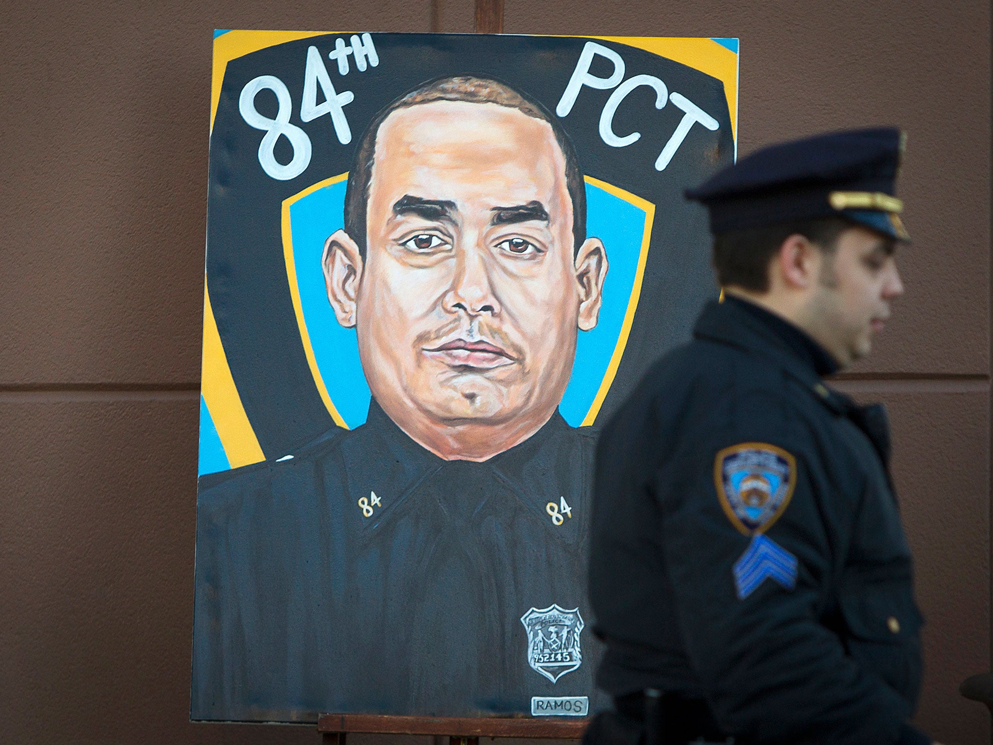 A painting of Rafael Ramos, one of the New York police officers killed by a gunman
