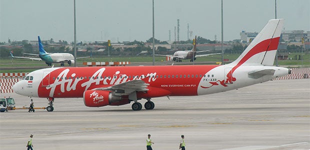 An AirAsia plane sits on the tarmac at Soekarno-Hatta airport in Tangerang near Jakarta