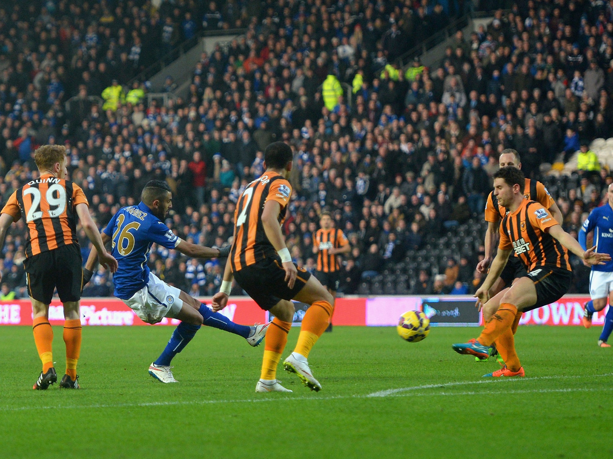 Riyad Mahrez of Leicester City scores the opening goal
