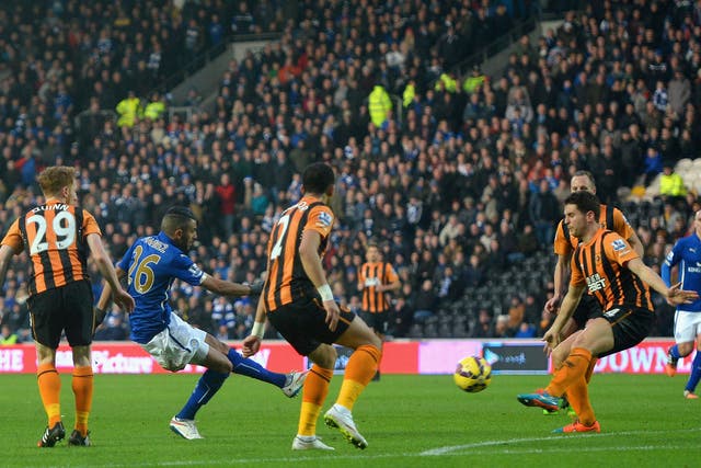 Riyad Mahrez of Leicester City scores the opening goal 