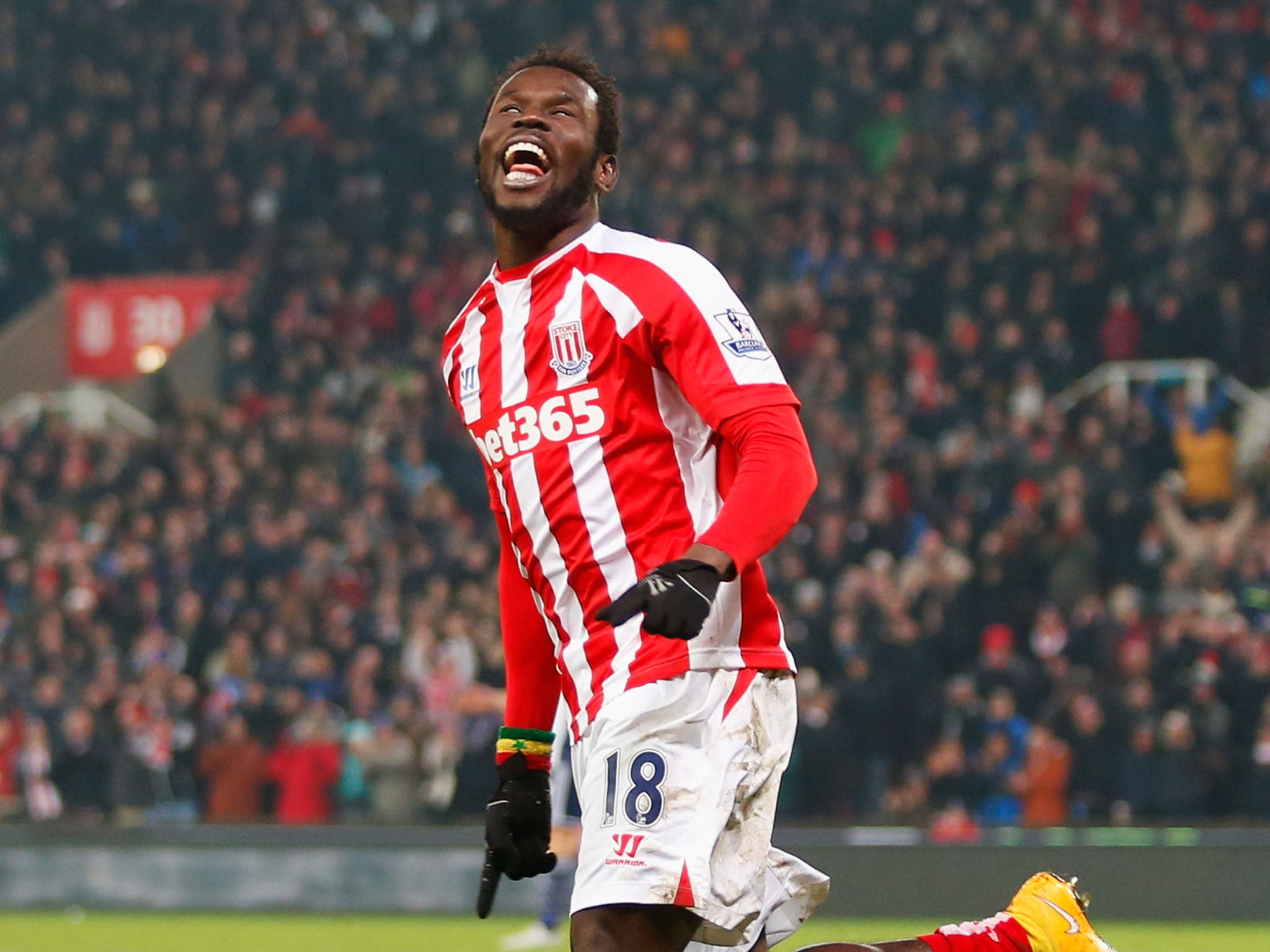 Mame Diouf celebrates his second against West Brom