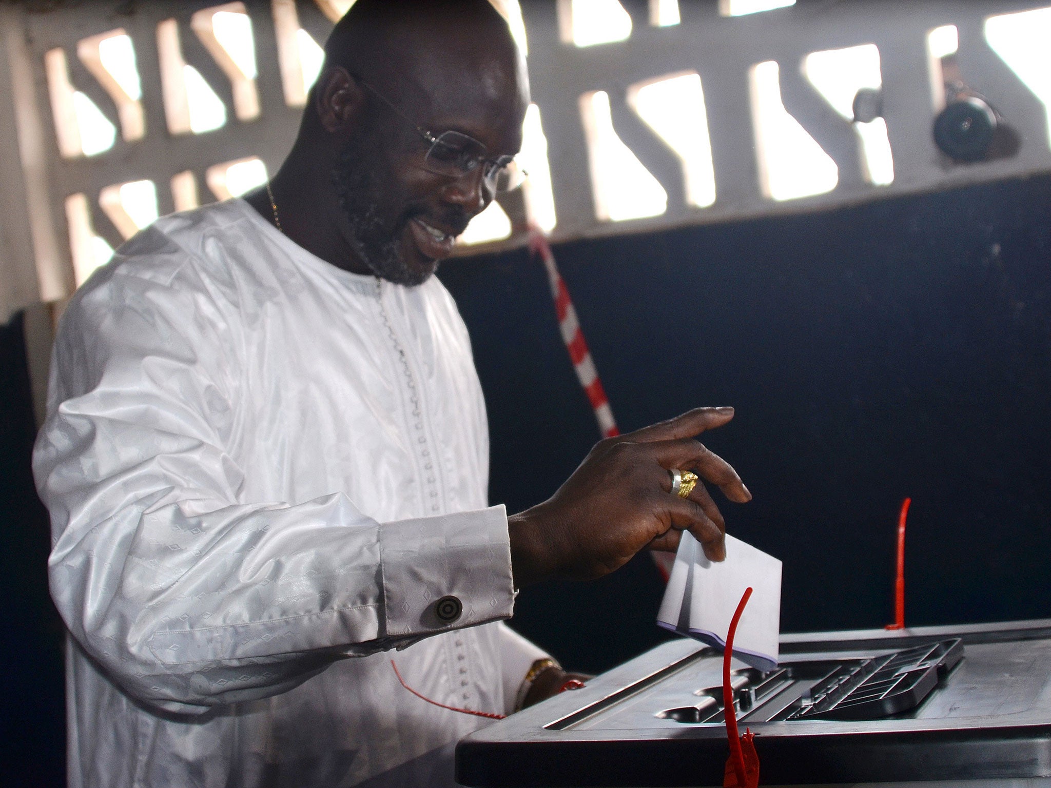 George Weah convincingly beat the President’s son with 78 per cent of the vote