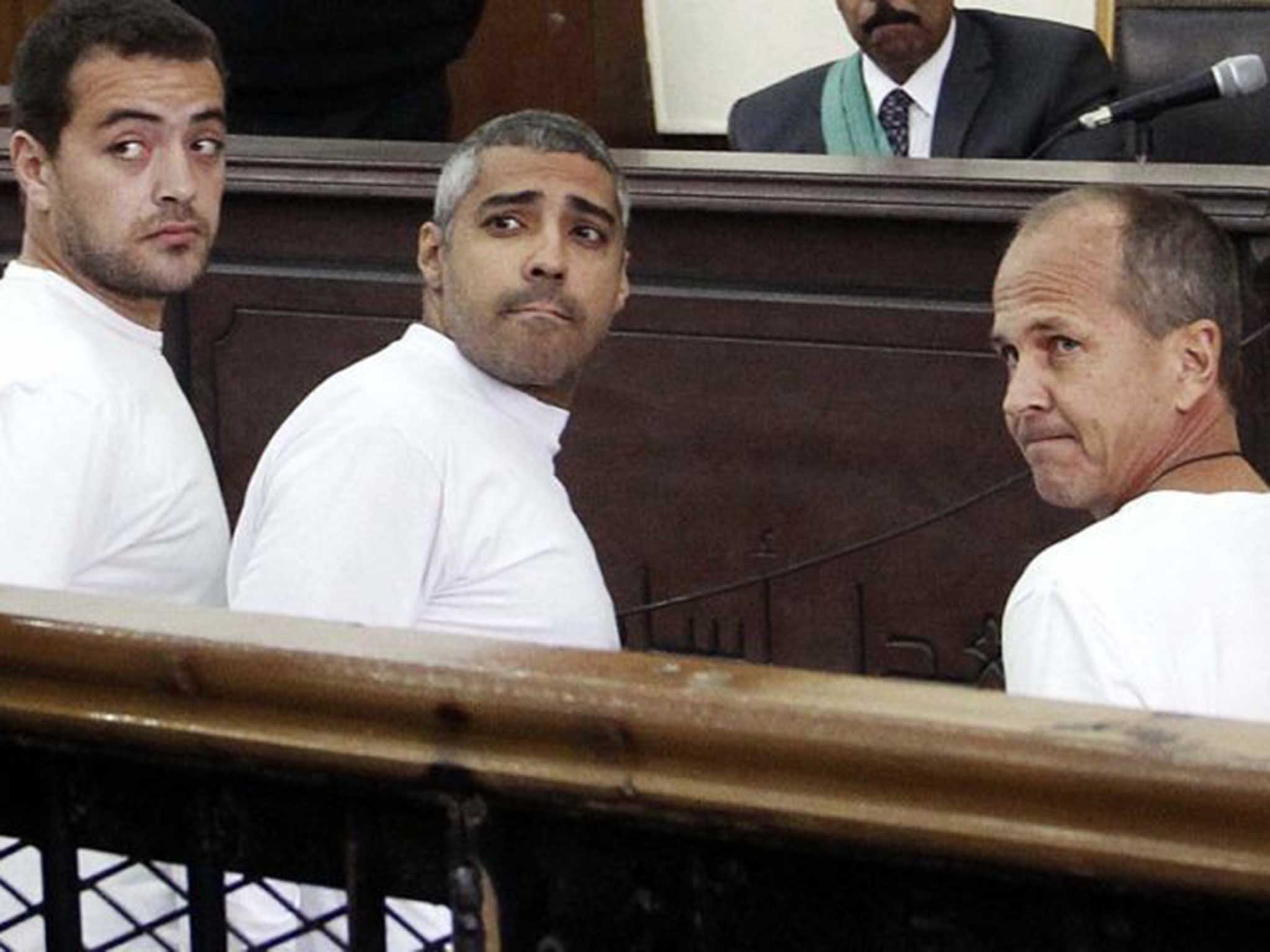 Baher Mohamed,Mohammed Fahmy and correspondent Peter Greste (from left to right)