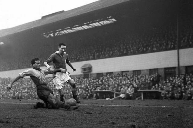 Hogg (right) in action for Leicester City in 1955