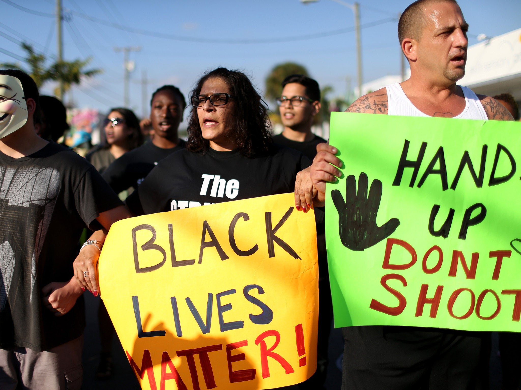 Demonstrators protest against the deayth of Michael Brow in Florida