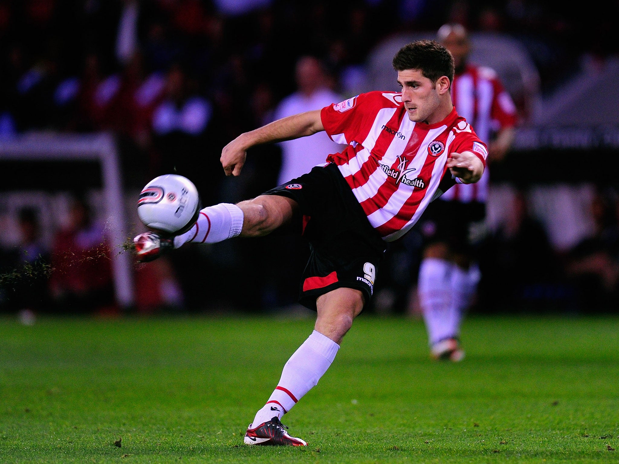 Evans playing for old club Sheffield United in 2011