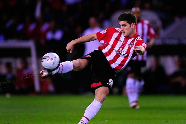 Evans playing for old club Sheffield United in 2011