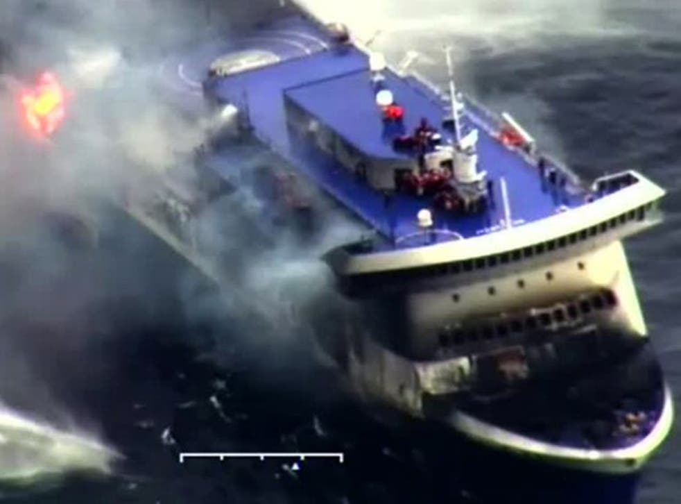A video made available by the Italian coast guard shows flames licking around the edges of the ‘Norman Atlantic’ ferry 