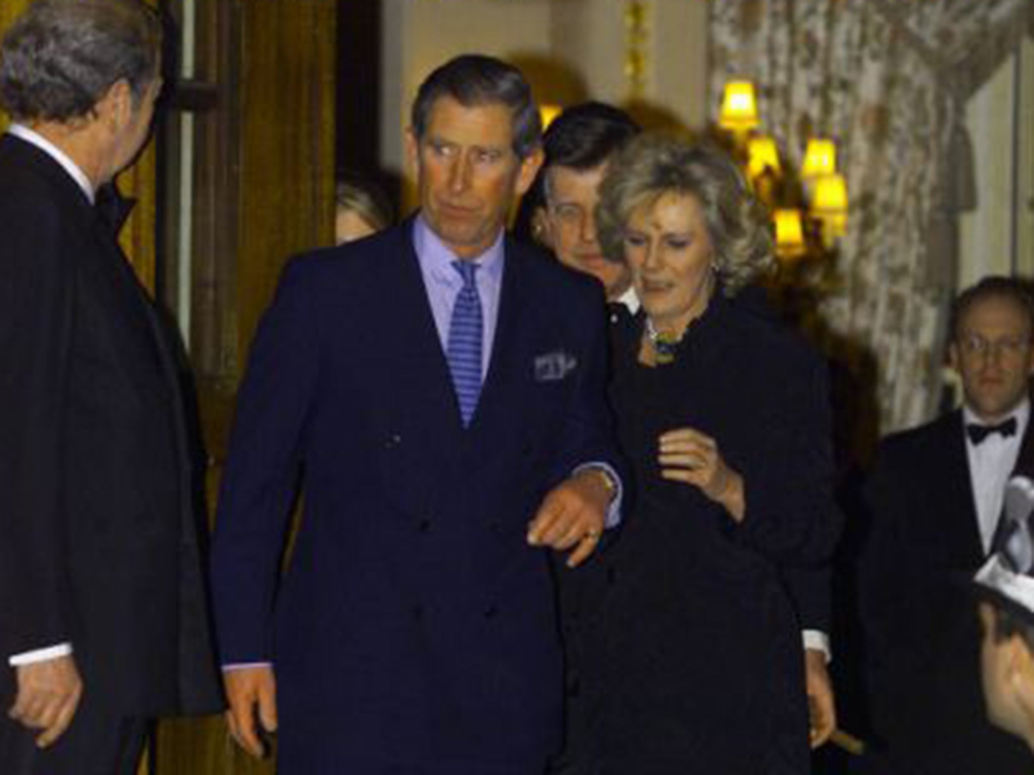 Prince Charles with Camilla Parker Bowles outside the Ritz Hotel in London in January 1999, at their first official public engagement together