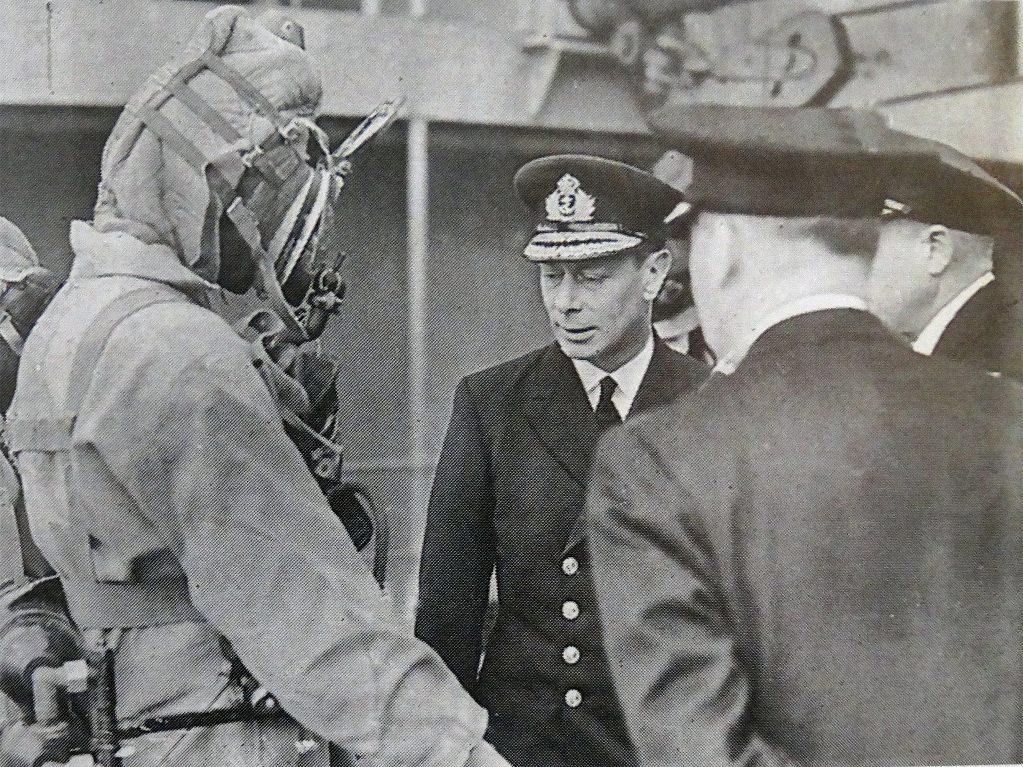 Tony Eldridge (in diving suit) meeting King George VI aboard HMS Bonaventure in 1944
