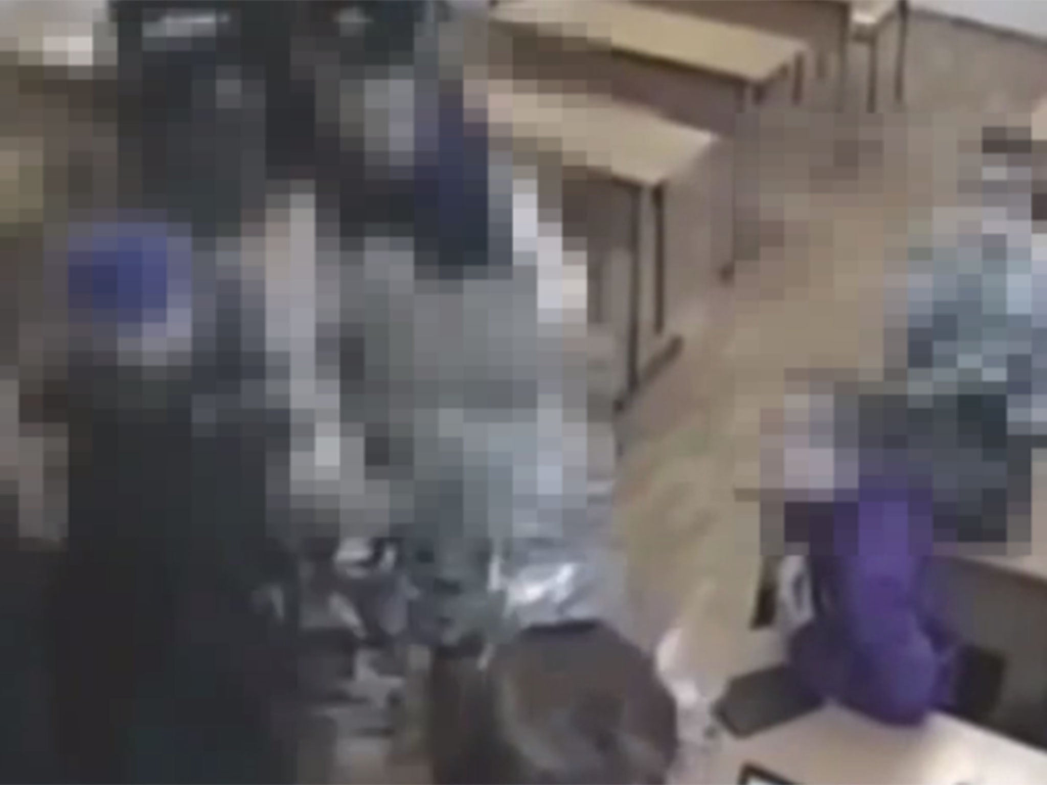 Shocking video shows moment Russian teenager was wrapped in cling film and suffocated on classroom floor.