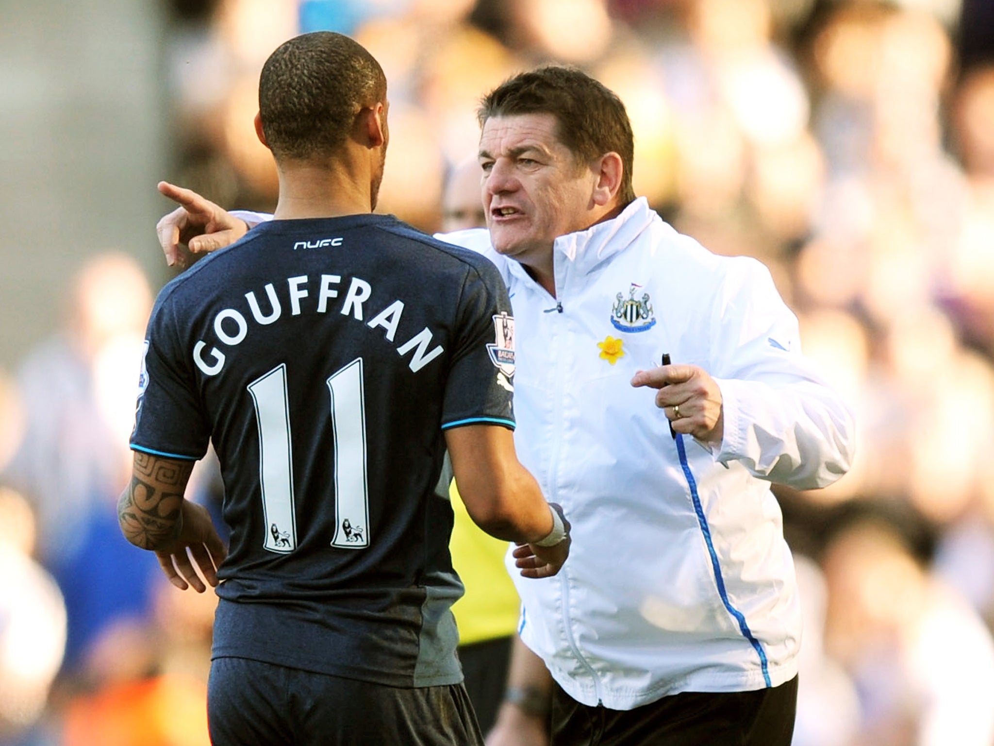 Newcastle manager John Carver gives instructions to Yoan Gouffran