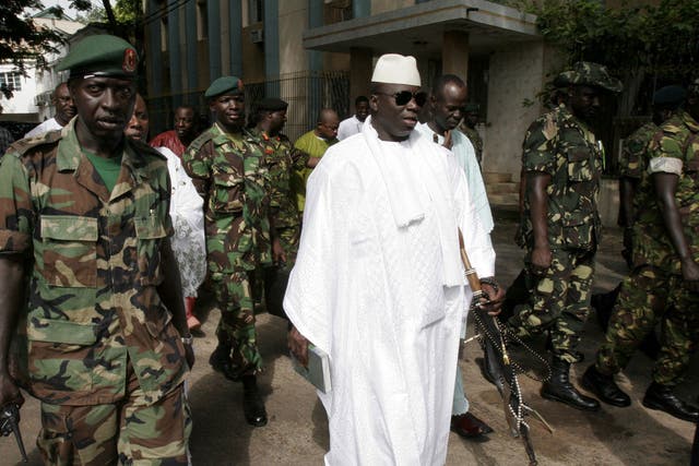 File: Gambian President Yahya Jammeh leaves a central Banjul polling station