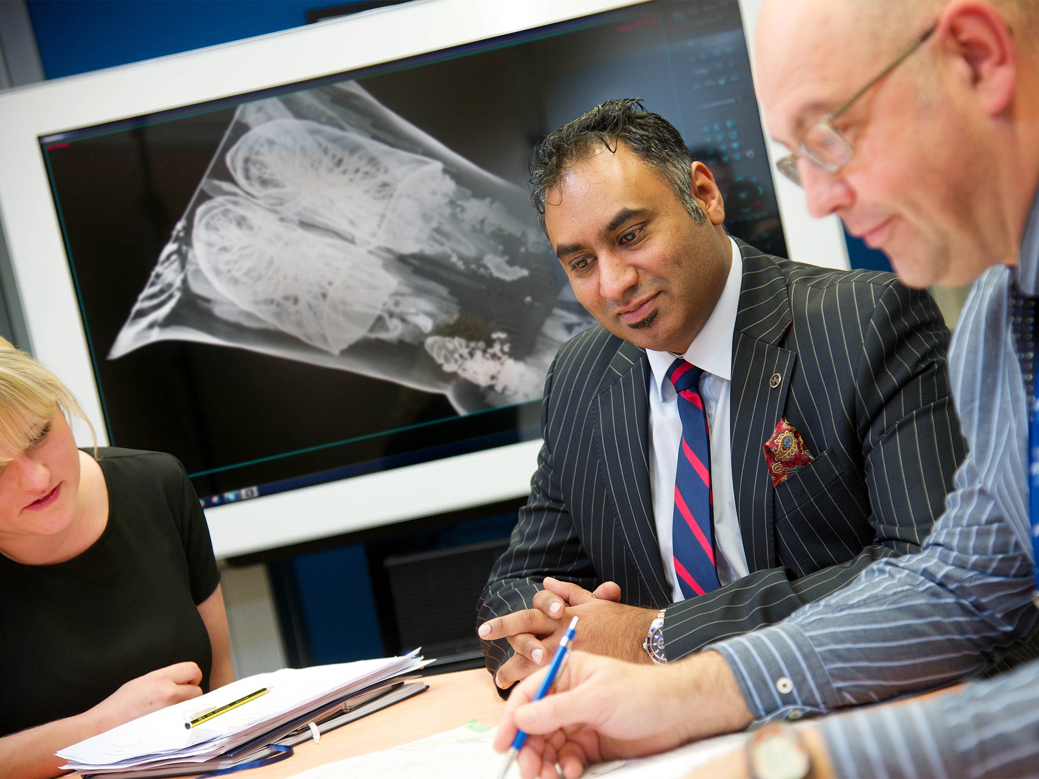 Ash Govind (centre) and his team at iGene