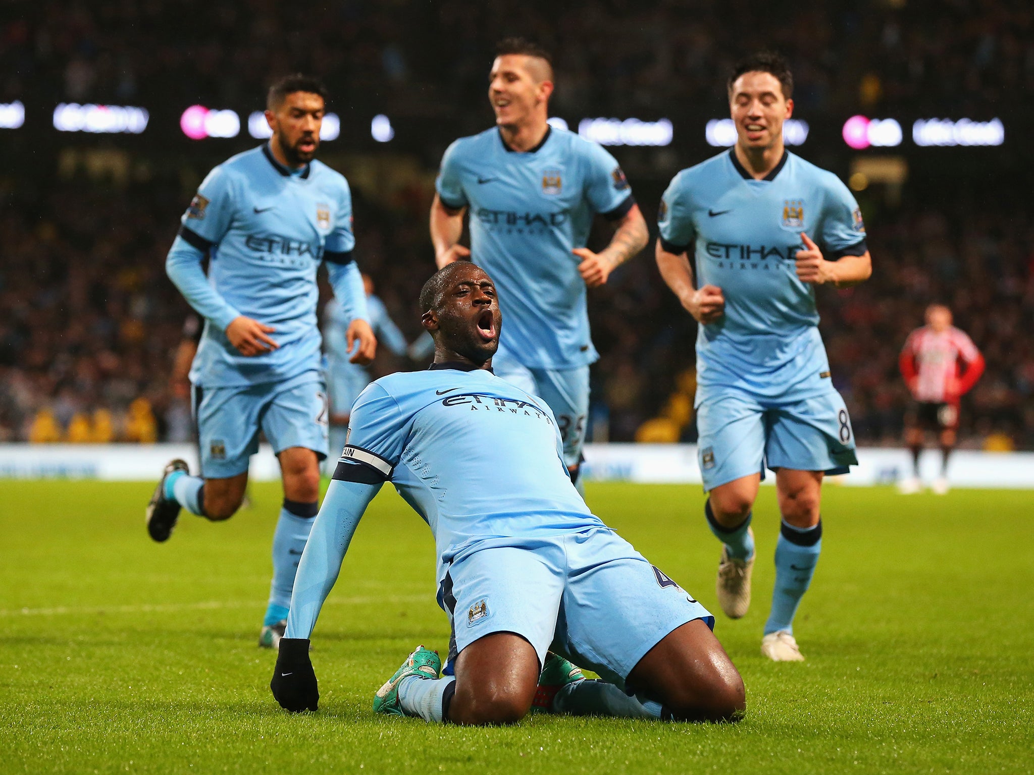 Yaya Toure of Manchester City celebrates the opening goal