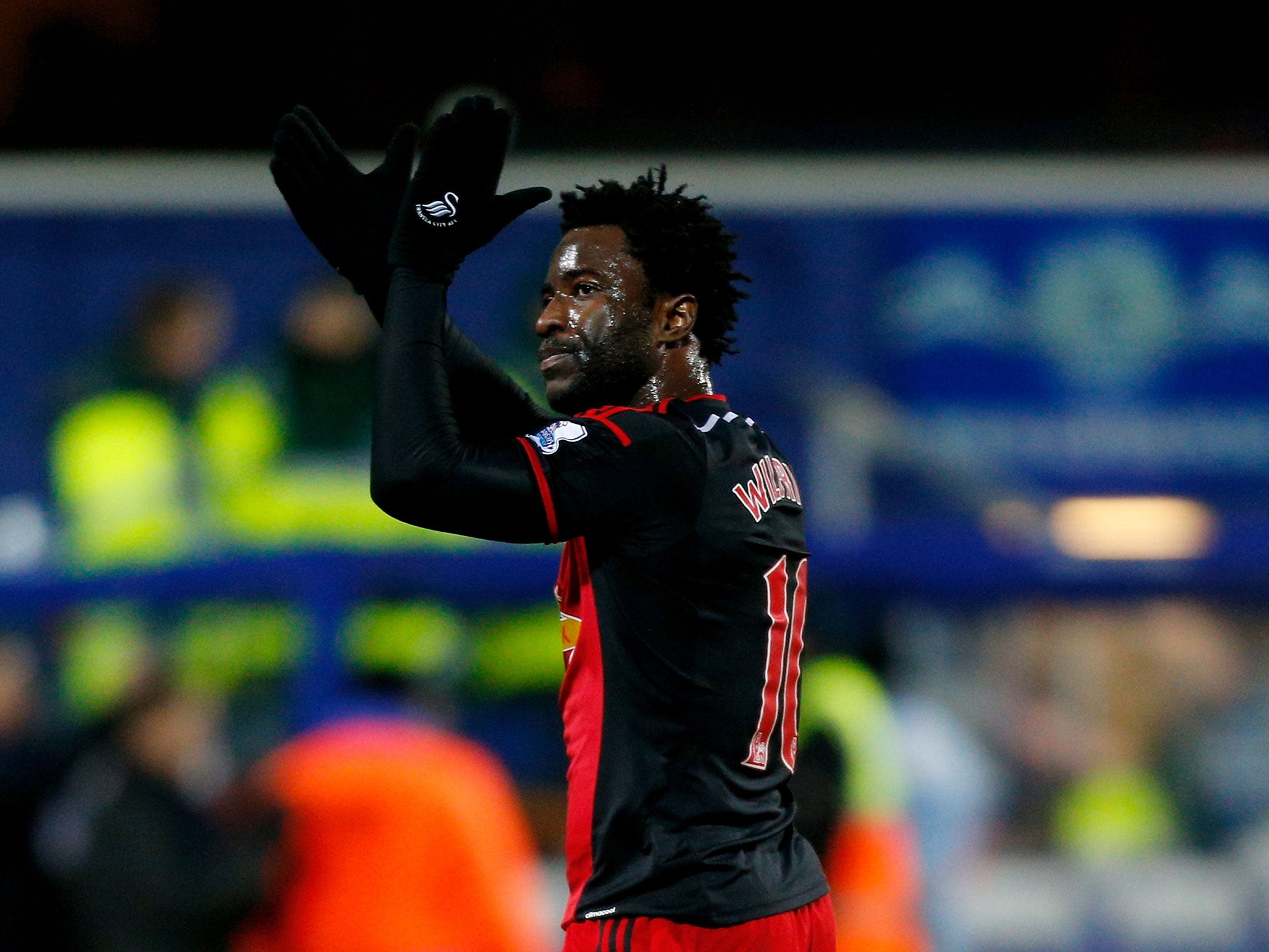 Wilfried Bony applauds the Swansea fans as he leaves the pitch
