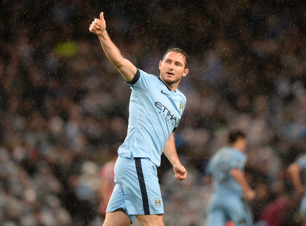 Manchester City's Frank Lampard celebrating scoring his sides third goal of the game during the Barclays Premier League match at the Etihad Stadium, Manchester 
