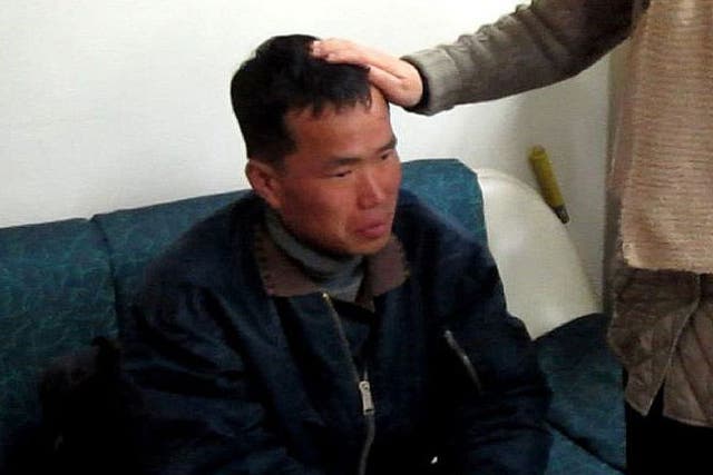 Kim Seong-baek, meets with his mother after he was rescued from a salt farm