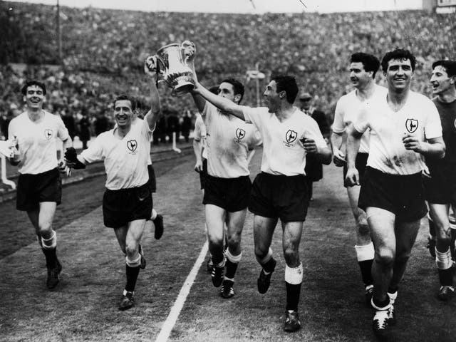 Glory days: Henry (far left) and his Spurs teammates parade the FA Cup at Wembley in 1962