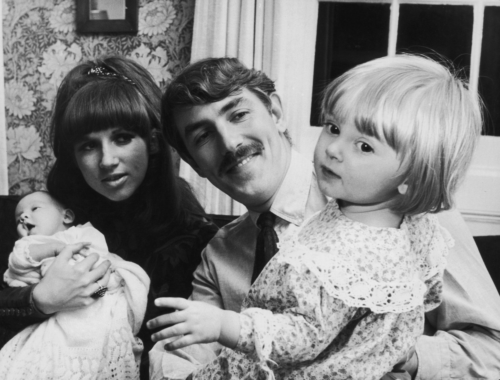 Cook at his Hampstead home with his wife Wendy and their daughters Lucy (right) and Daisy in 1965 (Getty Images)