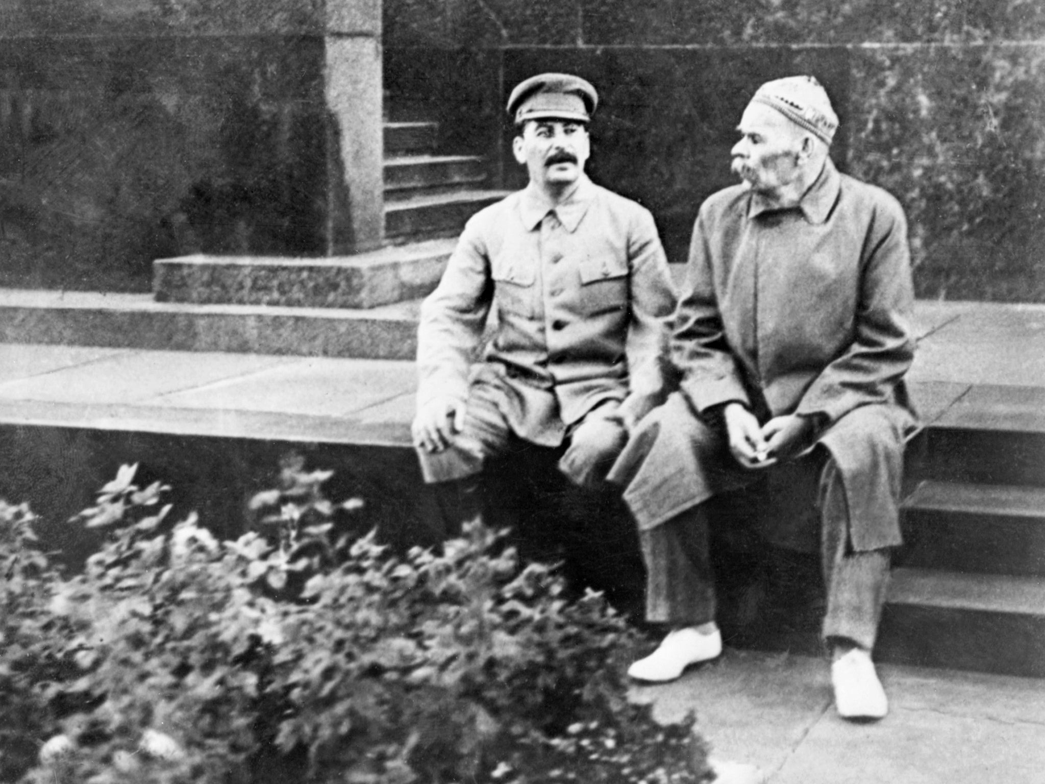 Stalin and Moura were believed to have been visiting Maxim Gorky (right) as the writer lay close to death