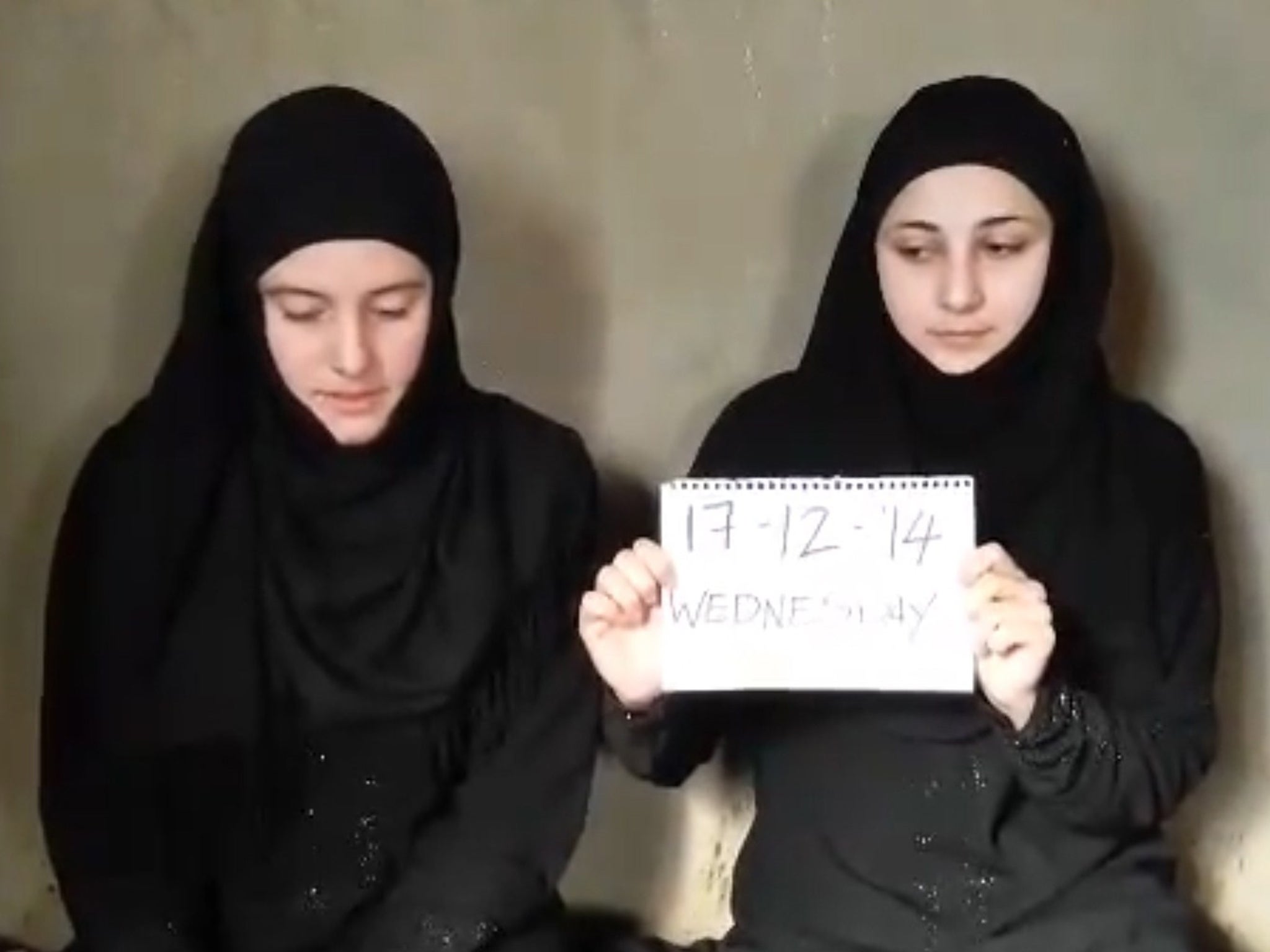 Vanessa Marzullo and Greta Ramelli appearing in a video posted by militants