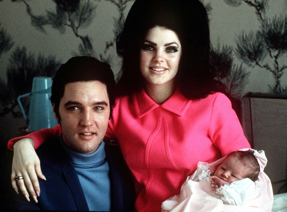 Elvis Presley with Priscilla and Lisa Marie