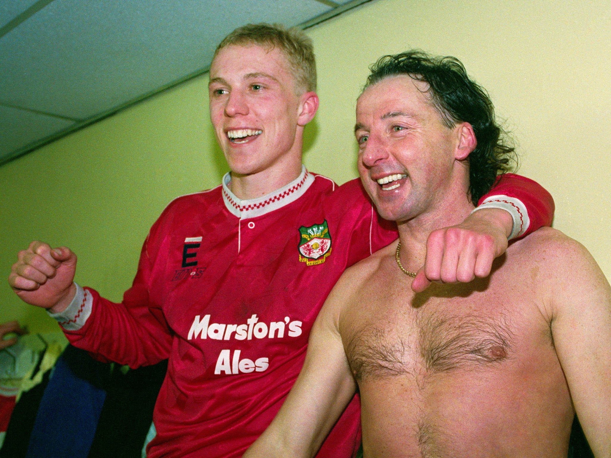 Wrexham goalscorers Steve Watkin (left) and Mickey Thomas celebrate after beating Arsenal in the third round in 1992