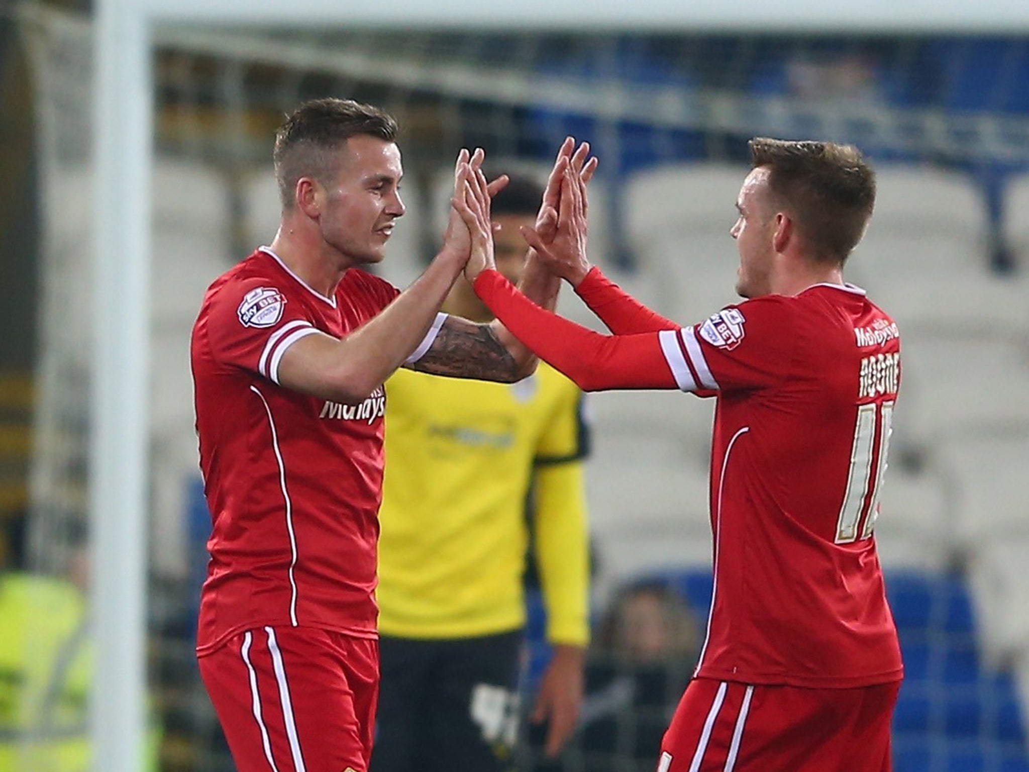 Joe Ralls (left) celebrates his goal for Cardiff with Craig Noone