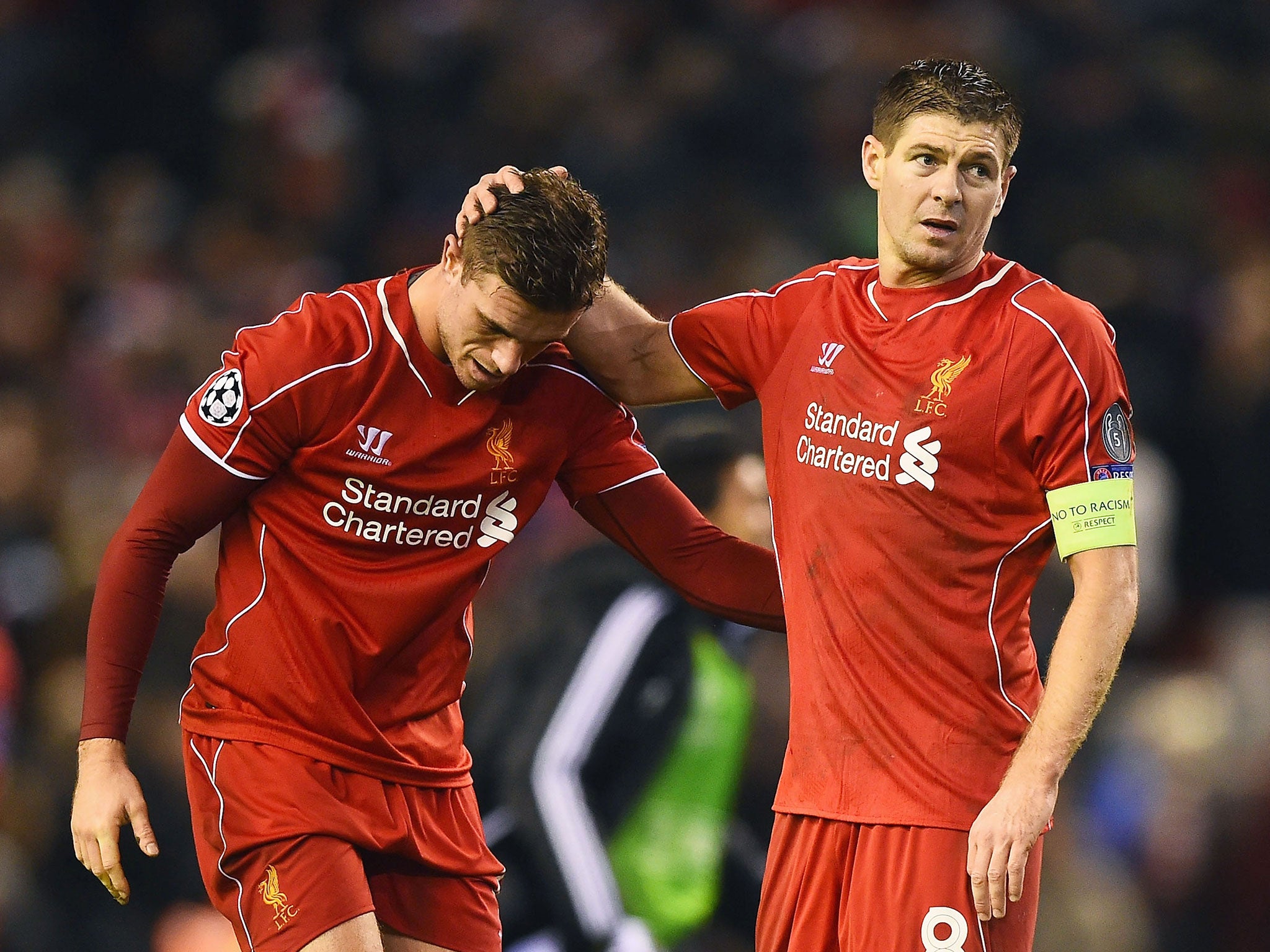 Steven Gerrard consoles Jordan Henderson after the 1-1 draw with Basle